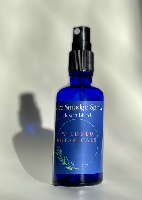 wild crafted small batch sagebrush smudge spray in a cobalt blue spray bottle 